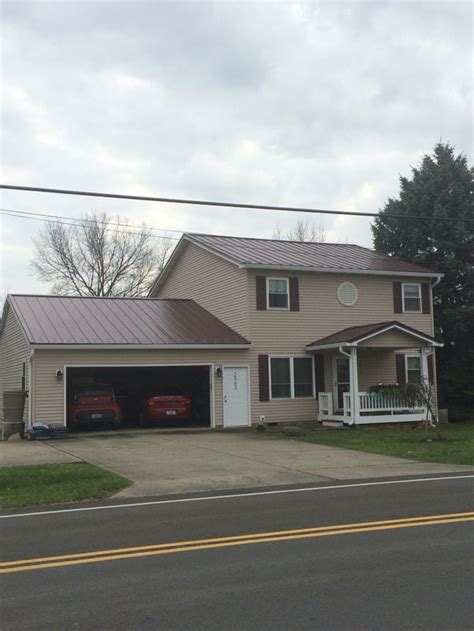 New 'burgundy' metal roof, December 2015. 